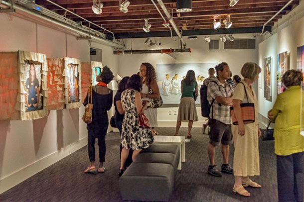 Patrons at War Baby / Love Child at Wing Luke Museum. Photo © Jake Kwong, 2013