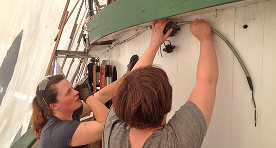 Working on electrical systems aboard Tudgboat Arthur Foss © 2015, courtesy of Northwest Seaport