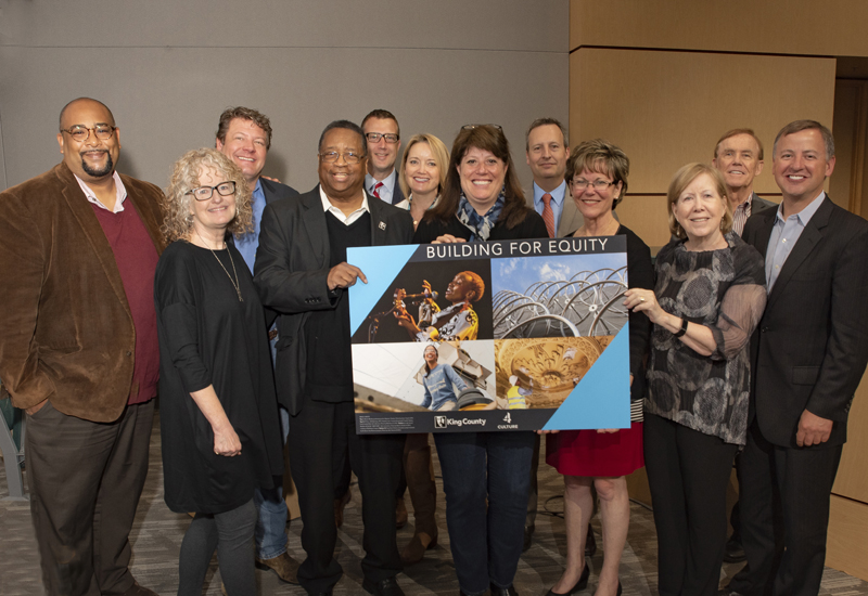 A photograph of 4Culture staff with King County Councilmembers and a Shannon Braddock from the King County Executive's office. 