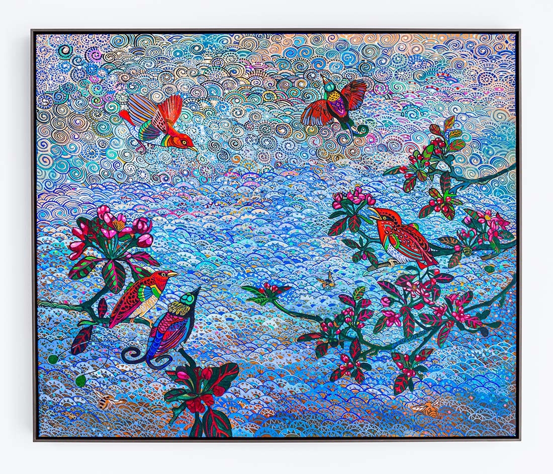 Colorful, intricate painting of birds perched on and flying around blossoming branches against a vibrant, swirling blue sky with decorative patterns and floral motifs. The artwork is framed in black.