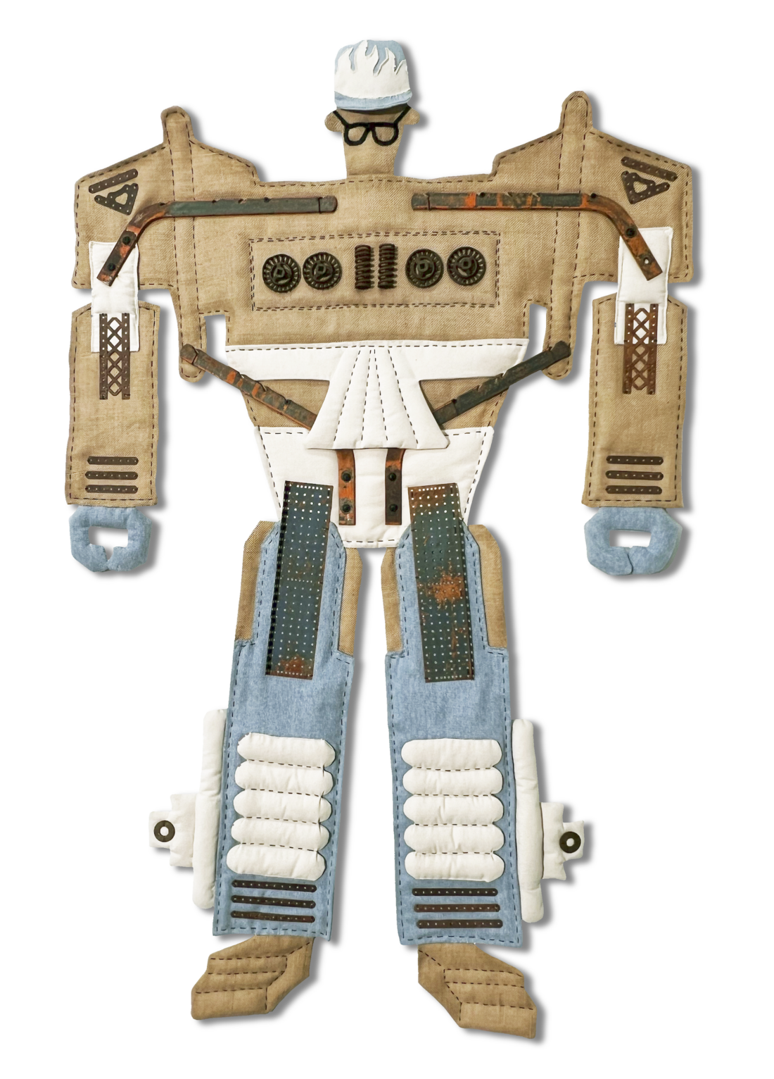A robot figure made from cardboard, fabric, buttons, and other textured materials, with denim-like legs, a white triangular section on its torso, and a blue-white head wearing dark glasses and a cap.