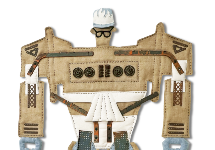 A robot figure made from cardboard, fabric, buttons, and other textured materials, with denim-like legs, a white triangular section on its torso, and a blue-white head wearing dark glasses and a cap.